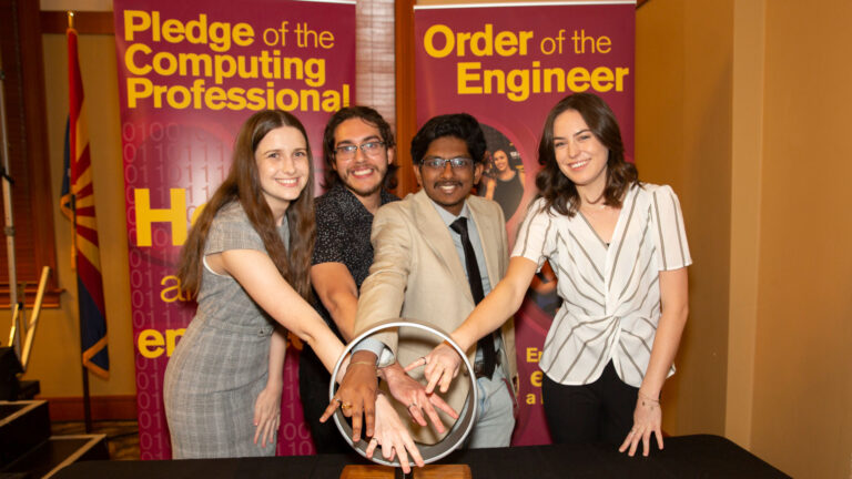 Students participate in the Order of the Engineer and Pledge of the Computing Professional ceremonies.