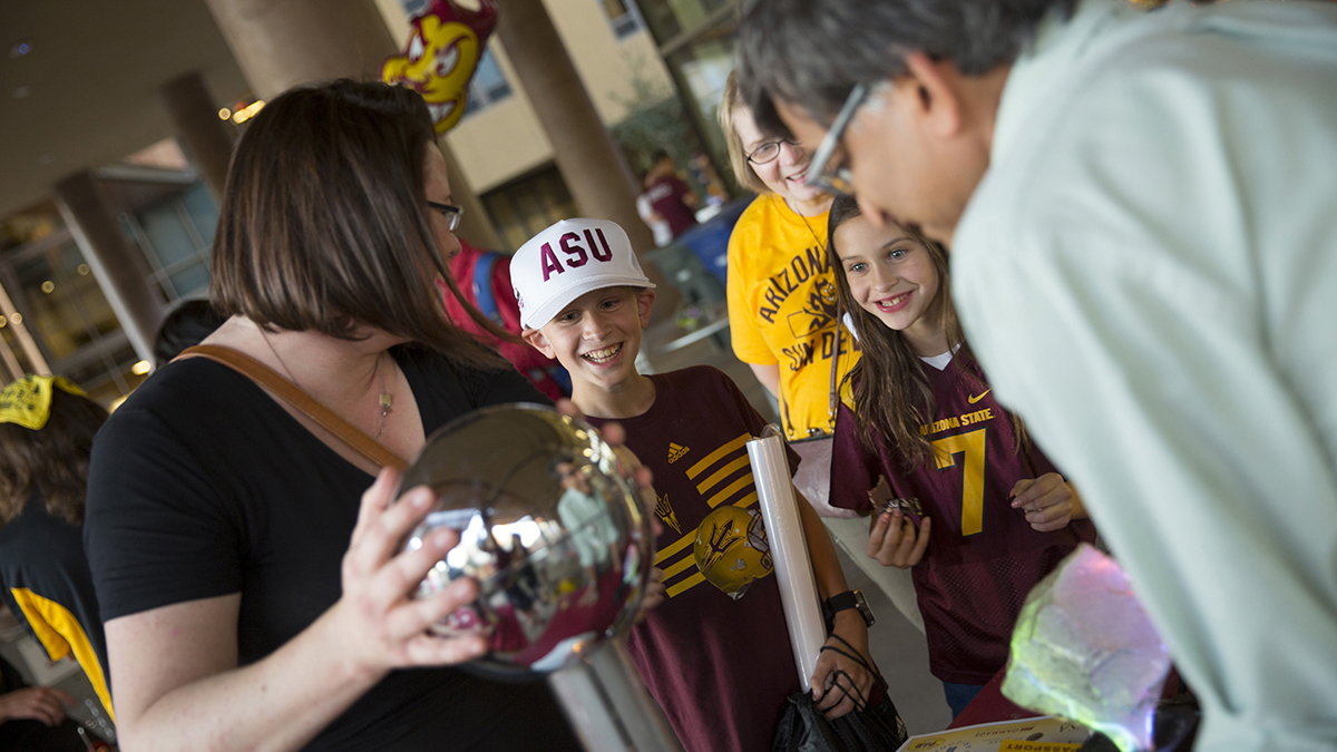 An ASU family attends the Homecoming Block Party