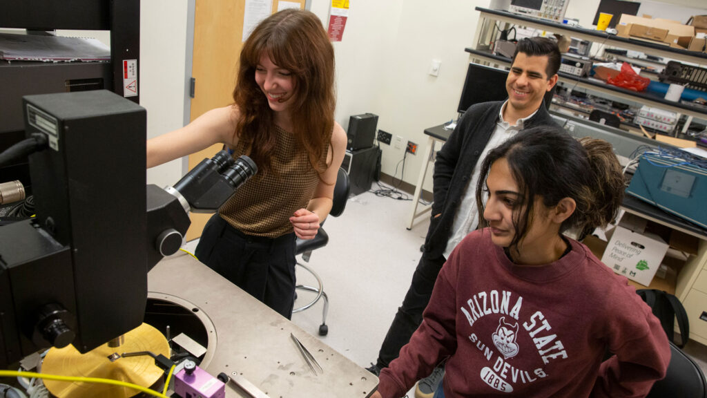 ASU students Hailey Warner and Priyanka Ravindran work with faculty mentor Ivan Sanchez Esqueda in a lab.